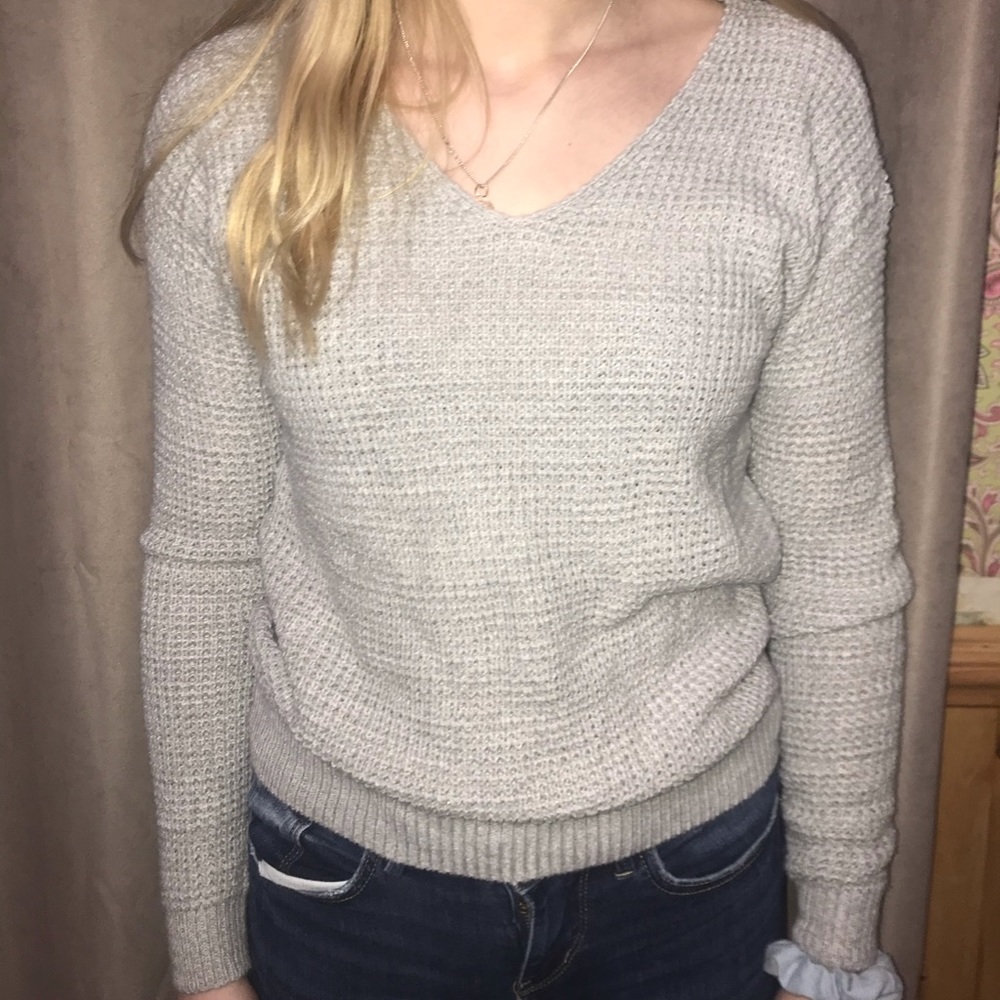 Grey knitted sweater